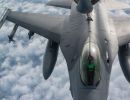 F-16 pilots, KC-135 crews team for mid-air refueling training